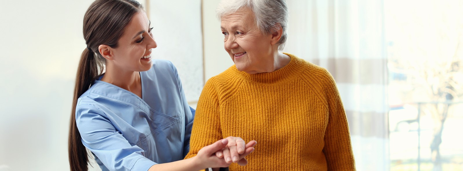 A nurse is assisting an elderly person as you find with senior services in Glendora, California.